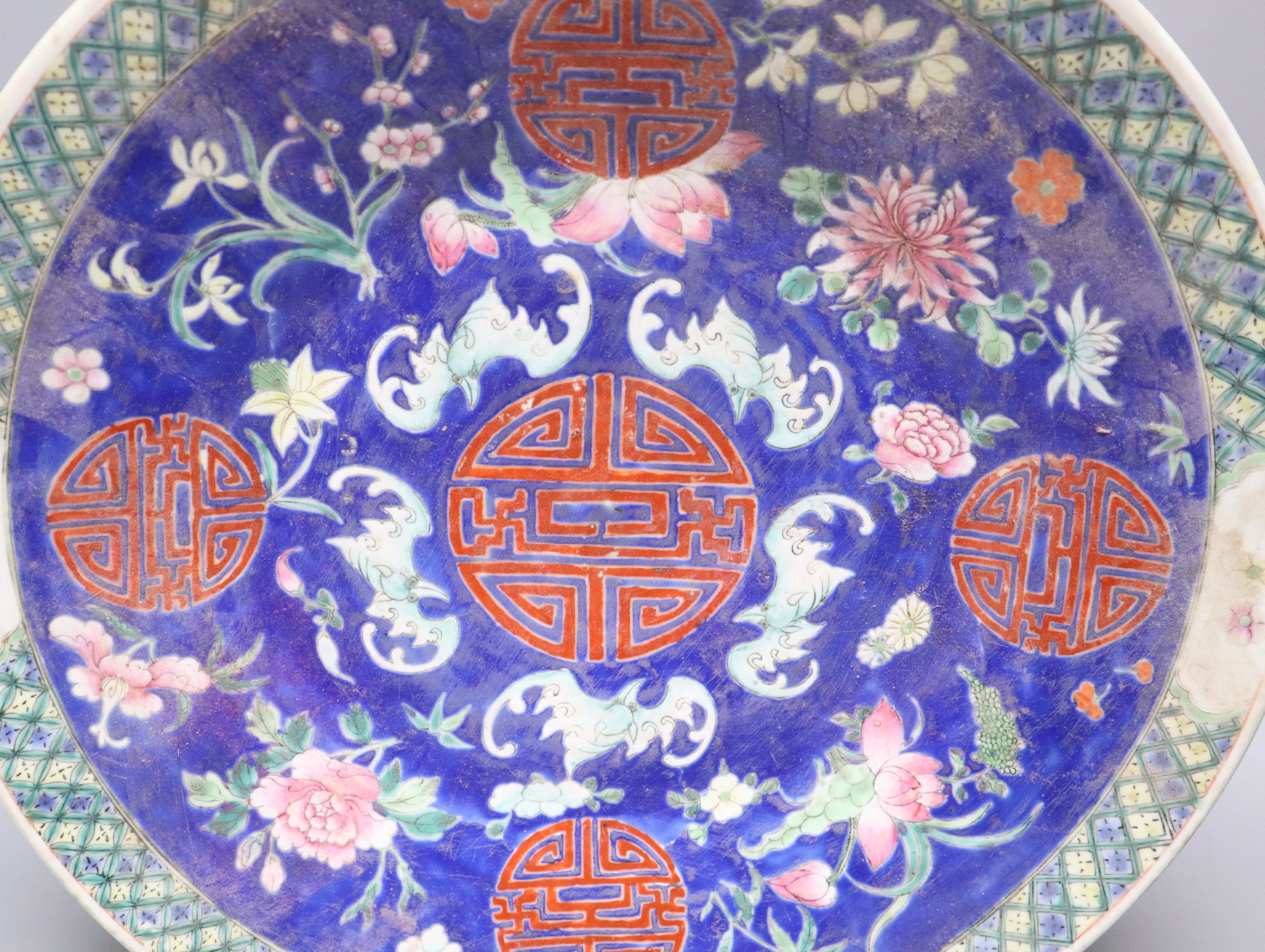 A 19th century Chinese bats & shou medallions dish, diameter 37cm, chip to rim